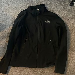 a black slim fit north face jacket